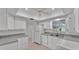 Bright kitchen featuring white cabinets and modern appliances at 3582 Milano Ave, Lakeland, FL 33803