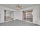 Enclosed sunroom with sliding glass doors and windows, offering plenty of natural light at 3582 Milano Ave, Lakeland, FL 33803