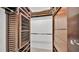 This well-organized walk-in closet features drawers, shelving and hanging rods at 3582 Milano Ave, Lakeland, FL 33803