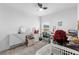 Versatile bedroom with workspace, crib, and bright, natural light at 389 Singing Sands Cir, Lake Wales, FL 33859