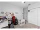 Functional bedroom with workspace, crib, and ample closet space at 389 Singing Sands Cir, Lake Wales, FL 33859