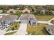 Charming one-story home boasts a well-manicured lawn, tasteful landscaping, and an attached two-car garage at 389 Singing Sands Cir, Lake Wales, FL 33859