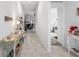 Bright hallway with an inviting view of the living room and connecting bedrooms at 389 Singing Sands Cir, Lake Wales, FL 33859