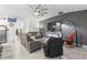 Open-concept living room boasts media center and neutral walls for easy decorating at 389 Singing Sands Cir, Lake Wales, FL 33859
