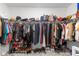 Spacious walk-in closet with organized shelving and racks for clothing and accessories at 389 Singing Sands Cir, Lake Wales, FL 33859