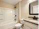Bathroom with shower-tub combo, modern fixtures, and stylish vanity at 4887 Sw 159Th Lane Rd, Ocala, FL 34473