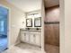 Bright bathroom with double sink vanity and tiled walk-in shower at 4887 Sw 159Th Lane Rd, Ocala, FL 34473