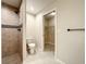 Walk-in shower and toilet and closet located in the main bathroom at 4887 Sw 159Th Lane Rd, Ocala, FL 34473