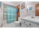 Bathroom with a shower, toilet, sink, and vanity at 940 Fenton Ln # 7, Lakeland, FL 33809