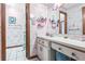 Bathroom with a mirror and wallpaper at 940 Fenton Ln # 7, Lakeland, FL 33809