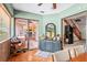 Dining room with a view of kitchen, main living room, and staircase at 940 Fenton Ln # 7, Lakeland, FL 33809