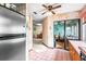 Kitchen with stainless steel refrigerator and views to a dining area and the rest of the house at 940 Fenton Ln # 7, Lakeland, FL 33809