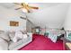 Cozy loft space with a ceiling fan and comfortable seating area at 940 Fenton Ln # 7, Lakeland, FL 33809