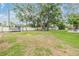 A spacious backyard features a trampoline and a play structure at 3120 S Polk Ave, Lakeland, FL 33803