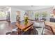Bright living room featuring hardwood floors, stylish decor, and lots of natural light at 3120 S Polk Ave, Lakeland, FL 33803