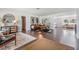 Inviting living room featuring stylish decor, hardwood floors, and lots of natural light at 3120 S Polk Ave, Lakeland, FL 33803