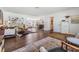 Inviting living room featuring stylish decor, hardwood floors, and open floor plan at 3120 S Polk Ave, Lakeland, FL 33803