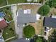 Aerial view displays a well-maintained property with mature trees and surrounding neighborhood at 4102 Stonehenge Rd, Mulberry, FL 33860