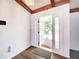 Inviting foyer with hardwood floors, fresh paint, and a view to the front door at 4102 Stonehenge Rd, Mulberry, FL 33860