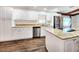 Bright kitchen featuring stainless appliances, granite countertops, and a kitchen island at 4102 Stonehenge Rd, Mulberry, FL 33860