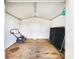 Interior of the shed shows the flooring, wall, and storage space at 4102 Stonehenge Rd, Mulberry, FL 33860