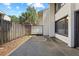 This home features a private back patio with mature trees for added shade and a relaxing backyard space at 4160 Player Cir # 109, Orlando, FL 32808