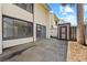 View of the rear of the home with sliding glass doors and backyard patio space at 4160 Player Cir # 109, Orlando, FL 32808