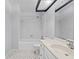 Bathroom features white tile, tub and shower combo and white sink and vanity at 4160 Player Cir # 109, Orlando, FL 32808