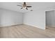 Well-lit bedroom with neutral walls, light flooring, ceiling fan and lots of natural light at 4160 Player Cir # 109, Orlando, FL 32808