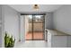Dining area with sliding glass doors leading to a private outdoor patio at 4160 Player Cir # 109, Orlando, FL 32808