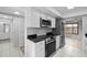 Updated kitchen boasting stainless appliances and stylish dark countertops at 4160 Player Cir # 109, Orlando, FL 32808