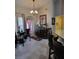 Bright breakfast nook featuring pendant lighting, tile flooring, and outdoor access at 4471 Marsh Harbor Dr, Tavares, FL 32778