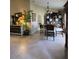 Open dining area with tiled floor, adjacent to another area of the home at 4471 Marsh Harbor Dr, Tavares, FL 32778