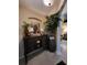 Tastefully decorated foyer with furniture, plants and an arched entry way at 4471 Marsh Harbor Dr, Tavares, FL 32778