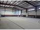 Spacious gymnasium showcasing a basketball court, high ceilings, and natural light, perfect for sports and community events at 4471 Marsh Harbor Dr, Tavares, FL 32778