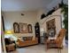Inviting living room featuring a comfortable sofa, stylish decor, and an elegant archway at 4471 Marsh Harbor Dr, Tavares, FL 32778