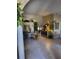 Spacious living room with tiled floors, neutral walls, decorative pillars and plants at 4471 Marsh Harbor Dr, Tavares, FL 32778