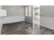 Dining room with new floors, chair rail, and window with natural light at 6125 Morningdale Ave, Lakeland, FL 33813