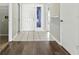 Inviting entryway featuring tile flooring and a white front door with glass inserts at 6125 Morningdale Ave, Lakeland, FL 33813
