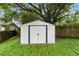 A metal storage shed offers secure space for outdoor equipment and belongings at 6125 Morningdale Ave, Lakeland, FL 33813