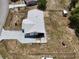 Aerial view showcasing the property's layout, driveway, backyard, and exterior at 17 Oak Loop, Ocala, FL 34472
