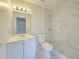 Modern bathroom with tiled walk-in shower, updated vanity, and stylish fixtures at 17 Oak Loop, Ocala, FL 34472