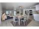 Open-concept living space with contemporary design and stainless steel appliances at 17 Oak Loop, Ocala, FL 34472