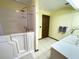 Bathroom with walk-in tub and updated sink at 2292 Se 170Th Avenue Rd, Silver Springs, FL 34488