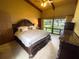 Bedroom with a king-size bed and nature view at 2292 Se 170Th Avenue Rd, Silver Springs, FL 34488