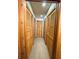 Hallway lined with closet doors providing an abundance of storage space at 2292 Se 170Th Avenue Rd, Silver Springs, FL 34488