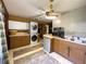 Laundry room with stacked washer and dryer, eat-in kitchen and sink at 2292 Se 170Th Avenue Rd, Silver Springs, FL 34488