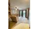 Living room with neutral carpet and sliding doors at 2292 Se 170Th Avenue Rd, Silver Springs, FL 34488