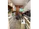 Walk-in pantry features wire shelving and storage for kitchen appliances at 2292 Se 170Th Avenue Rd, Silver Springs, FL 34488
