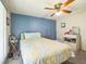 Comfortable bedroom featuring carpet, ceiling fan, and simple decor at 97 Parson Dr, Winter Haven, FL 33884